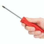 a hand holding a pen