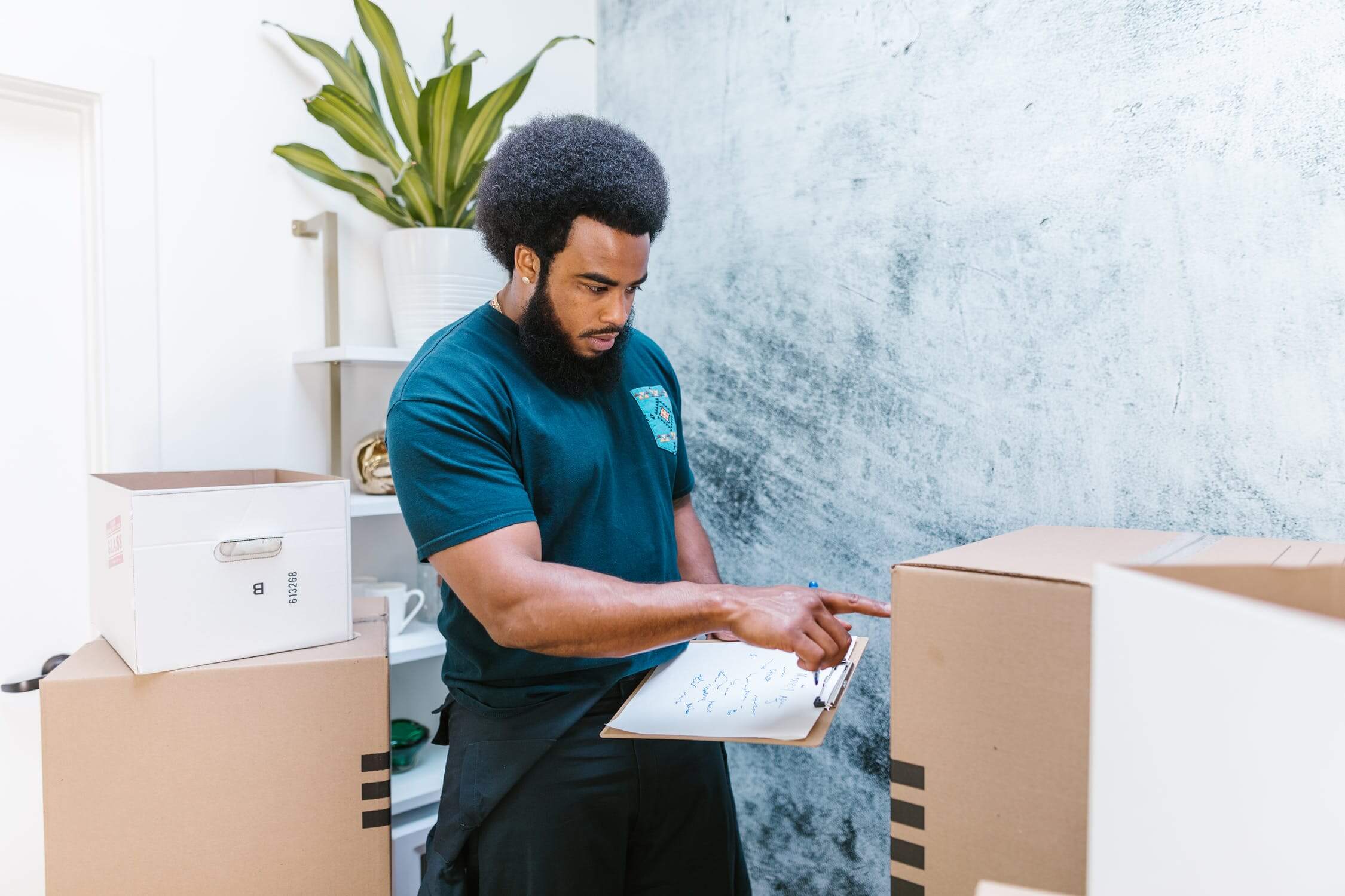 a man holding a paper