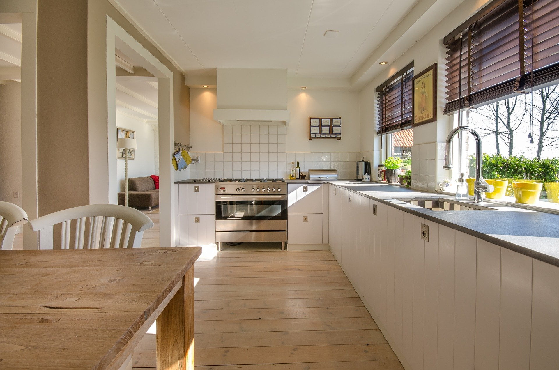 a kitchen with a table and a sink