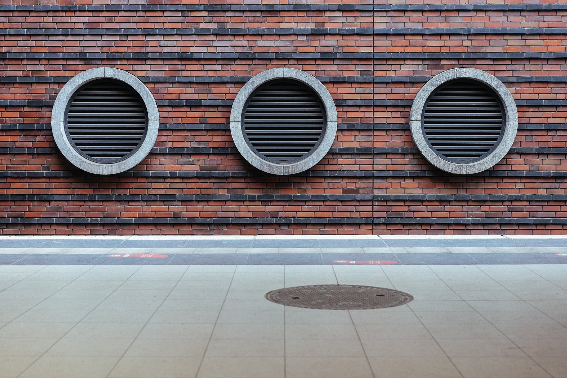a couple of round windows on a wall