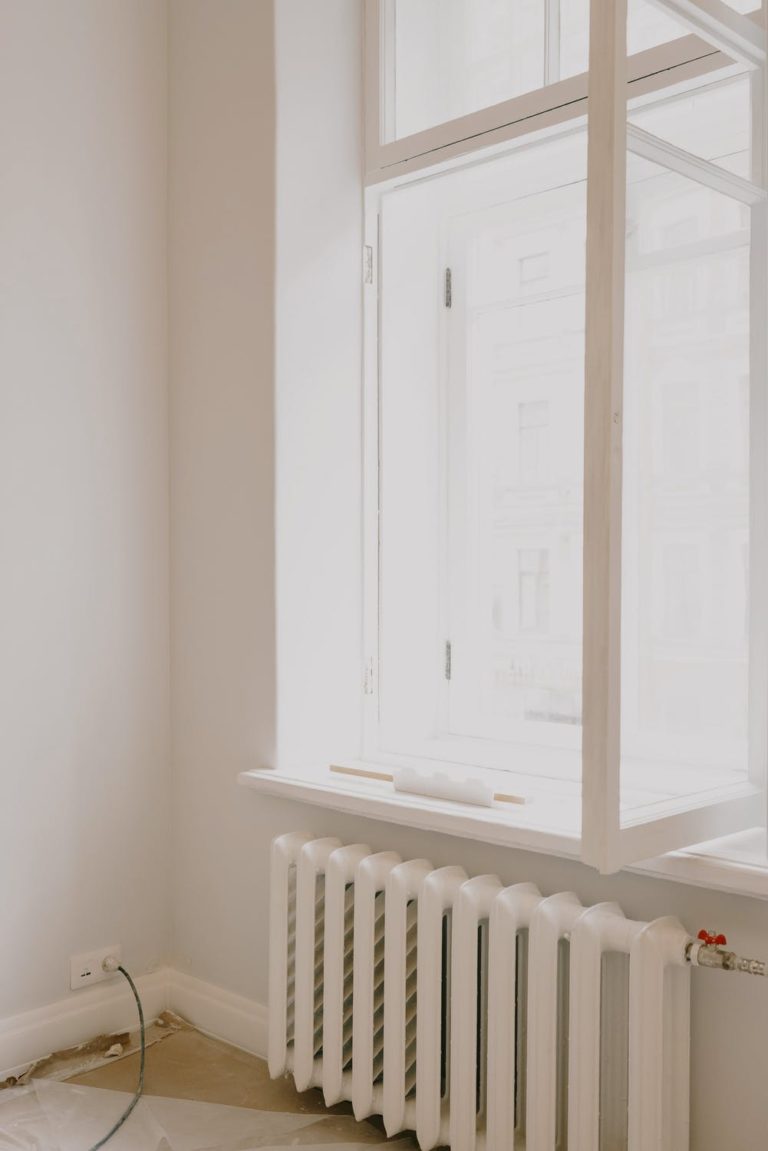 a white cabinet with a vent