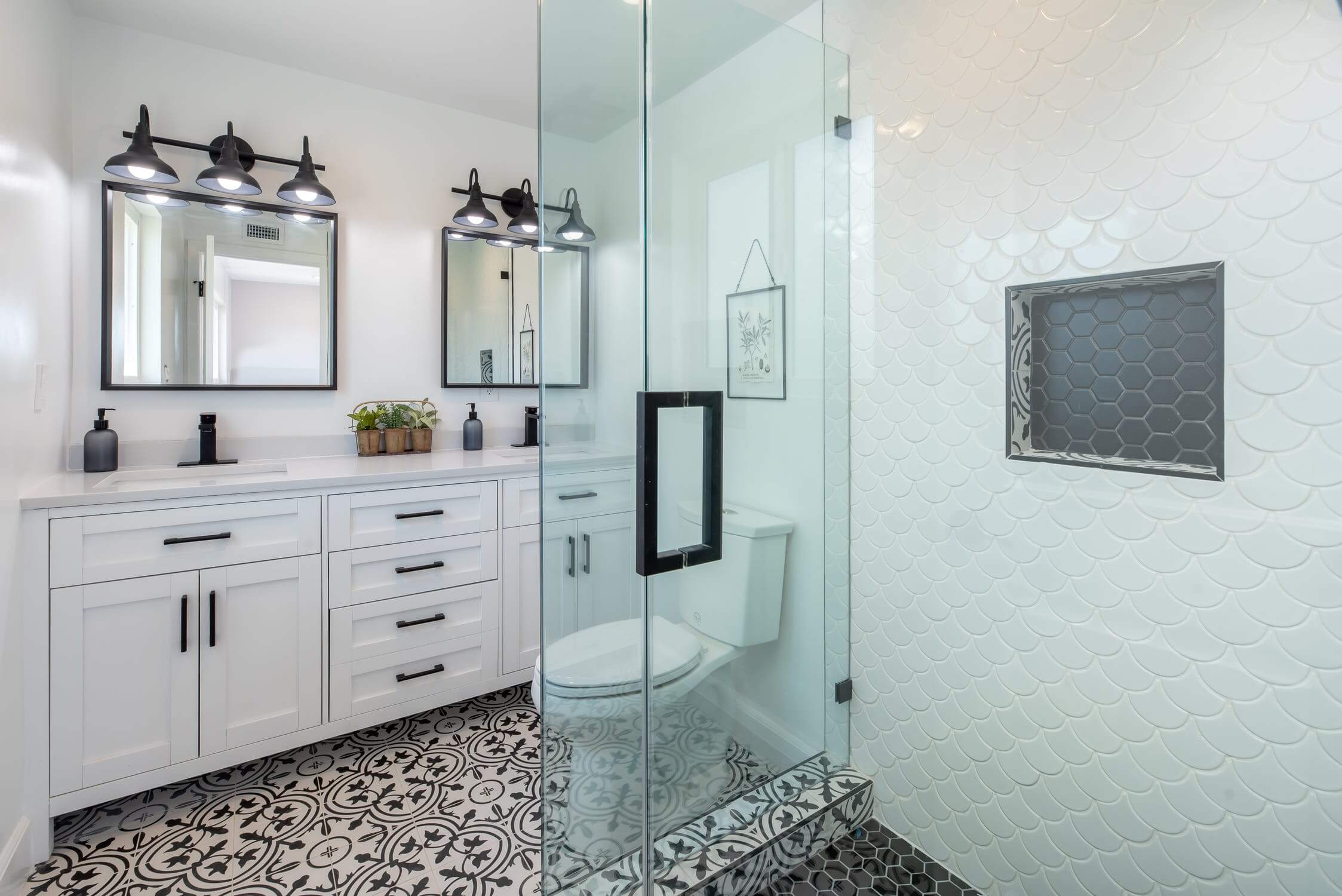 a bathroom with a glass shower