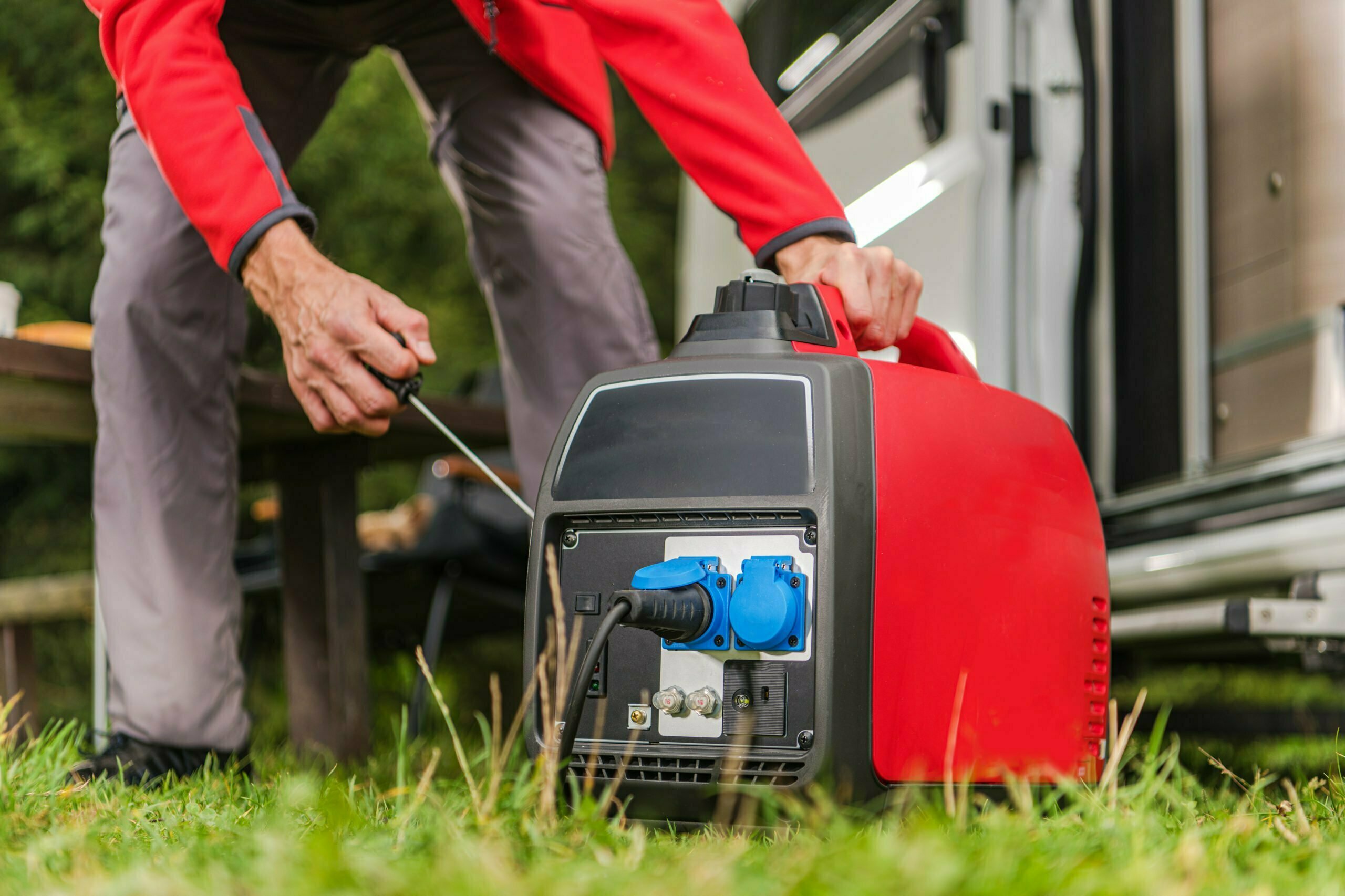 a man using a lawn mower