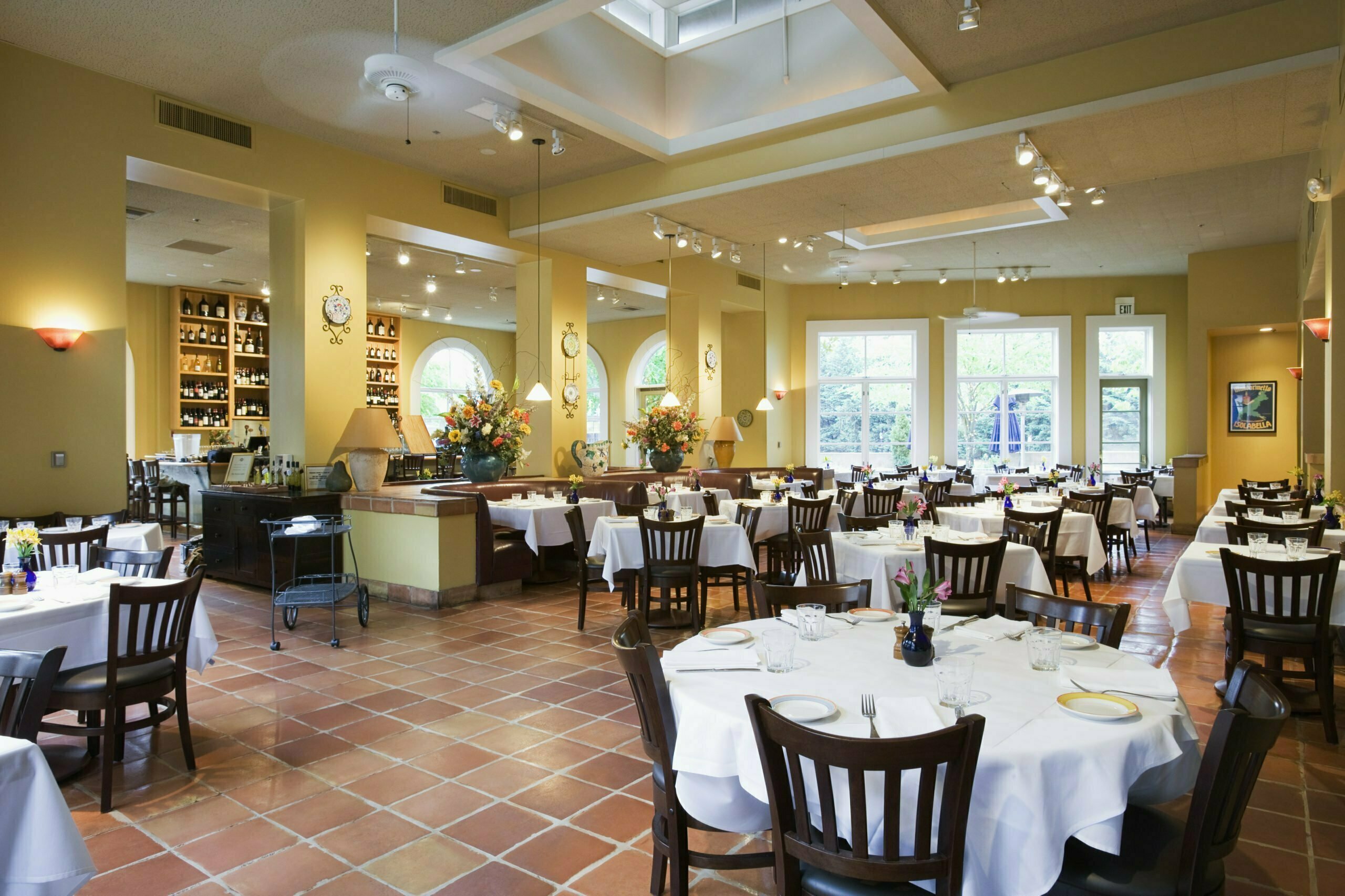 a large room with tables and chairs