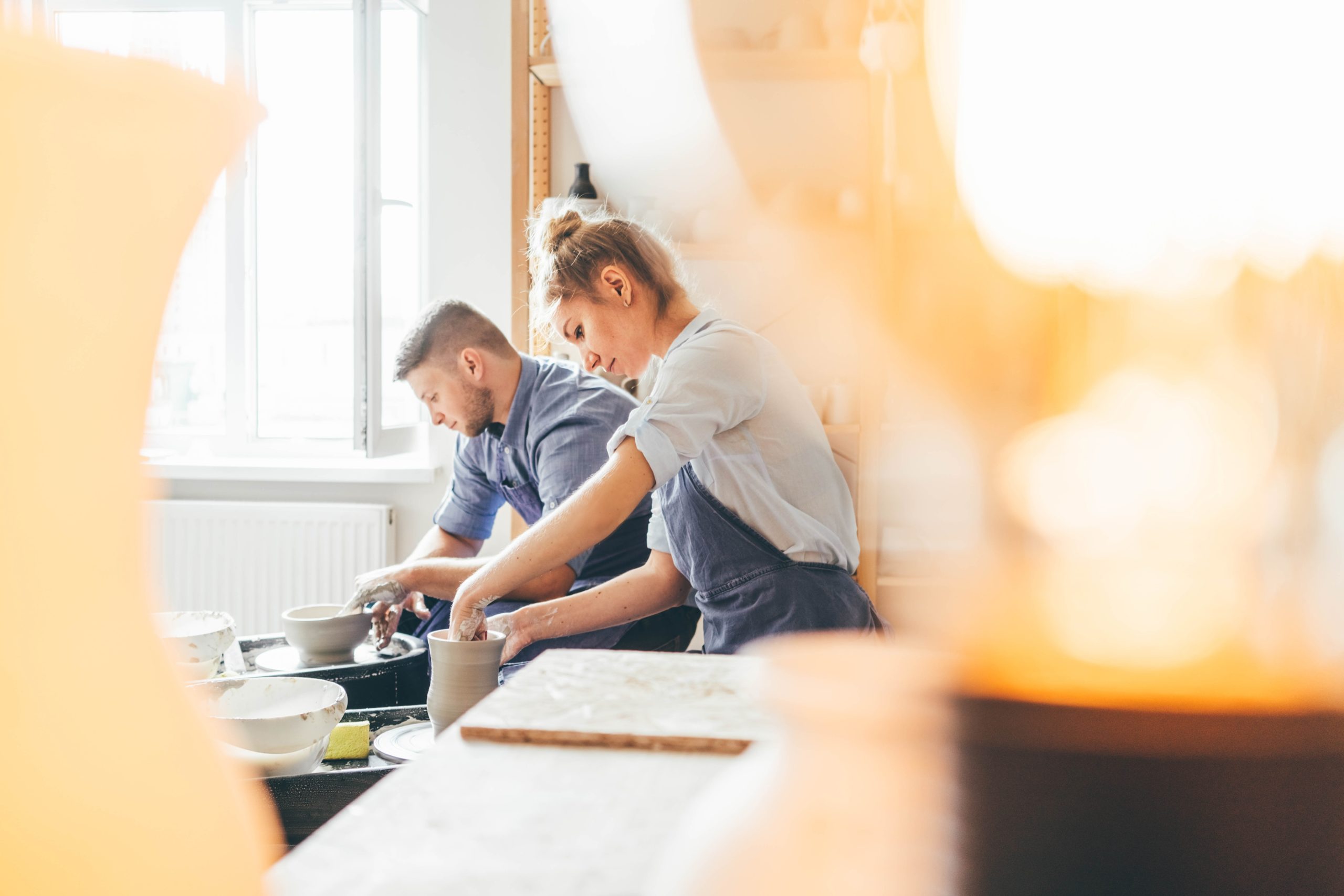 a man and a woman making food