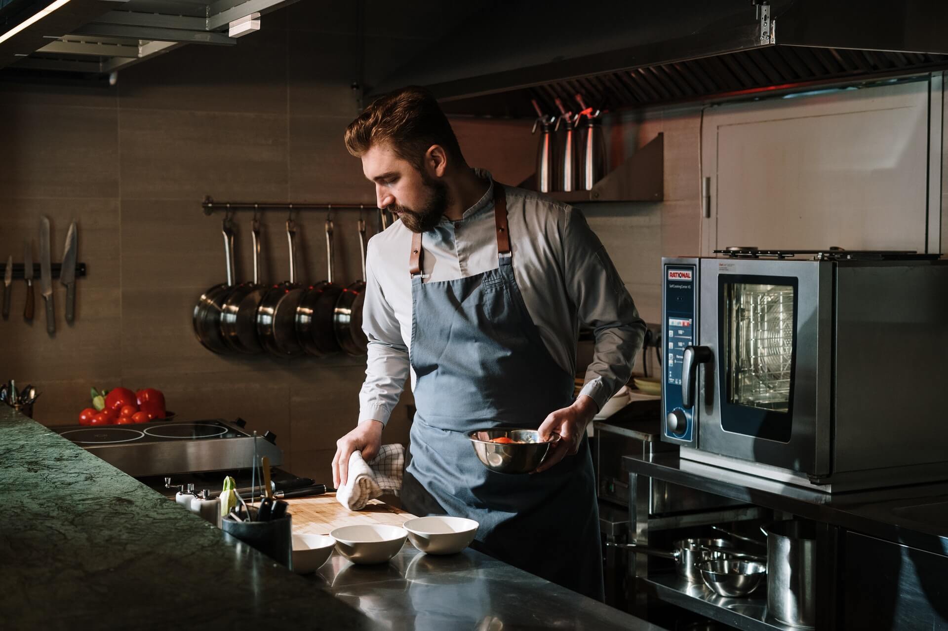 a person cooking in a kitchen